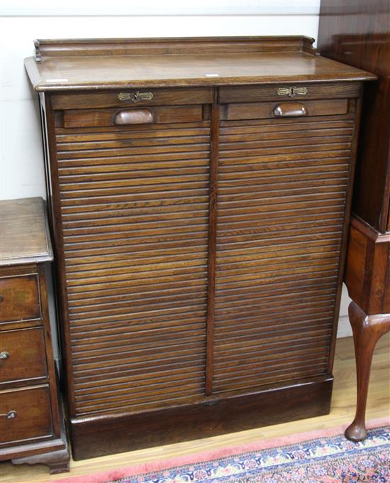 A 1920s oak filing cabinet W.93cm